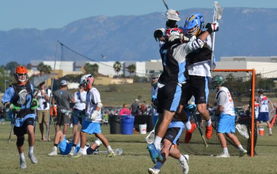 Beau Pederson celebrating a goal with a teammate